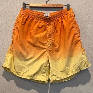 Yellow to orange gradient, bathing suit material shorts